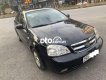 Daewoo Lacetti 2011 - Bán Daewoo Lacetti EX năm sản xuất 2011, màu đen số sàn