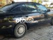 Daewoo Leganza 2002 - Cần bán gấp Daewoo Leganza sản xuất năm 2002, màu đen, xe nhập, 87tr