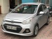 Hyundai Grand i10 2015 - Cần bán Hyundai Grand i10 1.2MT sản xuất năm 2015, màu bạc, xe nhập số sàn