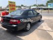 Mazda 626 2003 - Cần bán lại xe Mazda 626 sản xuất năm 2003, màu đen, 159tr