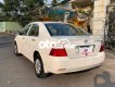 Toyota Corolla 2004 - Cần bán Toyota Corolla sản xuất năm 2004, màu trắng, nhập khẩu nguyên chiếc