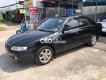 Mazda 626 2003 - Cần bán lại xe Mazda 626 sản xuất năm 2003, màu đen, 159tr