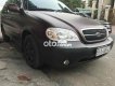 Kia Carnival 2009 - Xe Kia Carnival năm sản xuất 2009, màu nâu, nhập khẩu 