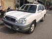 Hyundai Santa Fe 2004 - Cần bán gấp Hyundai Santa Fe năm 2004 xe gia đình giá 230tr