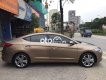 Hyundai Elantra 2016 - Cần bán xe Hyundai Elantra GLS 2.0 AT năm sản xuất 2016, màu vàng cát