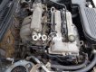 Ford Laser 2004 - Bán ô tô Ford Laser LXI năm 2004, màu bạc số sàn