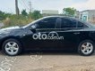 Chevrolet Cruze 2011 - Bán ô tô Chevrolet Cruze LS sản xuất 2011, màu đen số sàn, 245tr