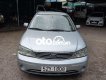 Ford Laser 2004 - Bán ô tô Ford Laser LXI năm 2004, màu bạc số sàn