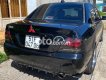 Mitsubishi Lancer 2003 - Bán ô tô Mitsubishi Lancer năm sản xuất 2003, màu đen số tự động, 185tr