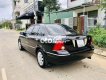 Ford Laser 2004 - Bán ô tô Ford Laser sản xuất 2004, màu đen, 157 triệu