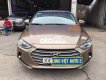 Hyundai Elantra 2016 - Cần bán xe Hyundai Elantra GLS 2.0 AT năm sản xuất 2016, màu vàng cát