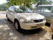 Toyota Corolla 1998 - Bán Toyota Corolla MT sản xuất năm 1998, màu kem (be), giá tốt