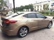 Hyundai Elantra 2016 - Cần bán xe Hyundai Elantra GLS 2.0 AT năm sản xuất 2016, màu vàng cát