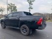 Toyota Hilux 2020 - Cần bán lại xe Toyota Hilux E năm sản xuất 2020, màu đen số tự động