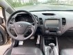 Kia K3 2014 - Bán Kia K3 1.6AT sản xuất năm 2014, màu vàng cát số tự động, 465 triệu