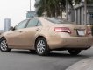 Toyota Camry 2009 - Bán xe Toyota Camry LE 2.5 năm sản xuất 2009, màu vàng, xe nhập