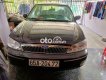 Ford Laser 2002 - Cần bán xe Ford Laser sản xuất 2002, màu đen xe gia đình, giá 110tr