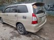 Toyota Innova 2012 - Cần bán lại xe Toyota Innova 2.0E sản xuất năm 2012, màu vàng 