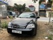 Daewoo Lacetti 2011 - Cần bán lại xe Daewoo Lacetti năm 2011, màu đen số sàn