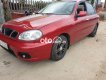 Daewoo Lanos 2003 - Cần bán lại xe Daewoo Lanos năm sản xuất 2003, màu đỏ, nhập khẩu