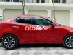 Mazda 2 2016 - Cần bán lại xe Mazda 2 AT sản xuất năm 2016, màu đỏ