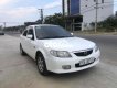 Mazda 323 2004 - Cần bán lại xe Mazda 323 sản xuất năm 2004, màu trắng