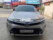 Toyota Camry 2018 - Cần bán lại xe Toyota Camry 2.0E năm sản xuất 2018, màu vàng, 830 triệu