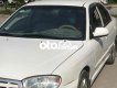 Kia Spectra 2004 - Bán xe Kia Spectra sản xuất 2004, màu trắng, nhập khẩu, giá 100tr