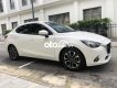 Mazda 2 2016 - Cần bán lại xe Mazda 2 1.5AT sản xuất năm 2016, màu trắng chính chủ