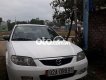 Mazda 323 2002 - Màu trắng, giá chỉ 120 triệu