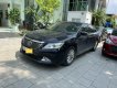 Toyota Camry 2.0E 2014 - Cần bán lại xe Toyota Camry 2.0E sản xuất 2014, màu đen, nhập khẩu chính hãng