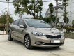 Kia K3 2015 - Màu vàng cát