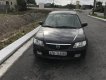 Mazda 323 2003 - Cần bán xe màu đen