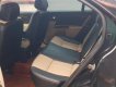 Ford Mondeo 2004 - Màu đen số tự động, 165tr
