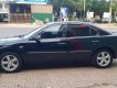 Ford Mondeo 2004 - Màu đen số tự động, 165tr