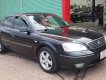 Ford Mondeo 2004 - Màu đen số tự động, 165tr