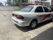 Mazda 323 2000 - Màu trắng, giá 65tr