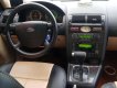 Ford Mondeo 2004 - Màu đen số tự động, 165tr
