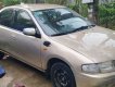 Mazda 323 2000 - Màu vàng, giá cạnh tranh