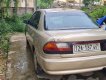 Mazda 323 2000 - Màu vàng, giá cạnh tranh
