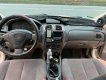 Mazda 323 2003 - Màu trắng, 105 triệu