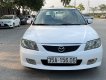 Mazda 323 2003 - Đổ xăng là vi vu