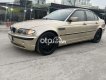 BMW 318i 2002 - Bán xe BMW 318i sản xuất năm 2002, màu vàng