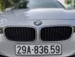BMW 320i 2013 - Cần bán gấp BMW 320i sản xuất 2013, màu bạc, giá tốt