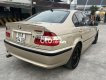 BMW 318i 2002 - Bán xe BMW 318i sản xuất năm 2002, màu vàng