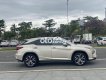 Lexus RX 200  T   2015 - Cần bán lại xe Lexus RX 200T sản xuất 2015, màu vàng còn mới