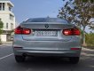 BMW 320i 2013 - Cần bán gấp BMW 320i sản xuất 2013, màu bạc, giá tốt
