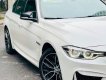 BMW 330i      2016 - Cần bán lại xe BMW 320i năm 2016, màu trắng, xe nhập, giá 955tr
