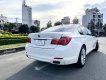 BMW 750Li 2011 - Đk 2010, một chủ, màu trắng zin, bản 4 ghế massage, full đồ chơi