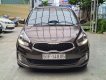 Kia Rondo 2015 - Số tự động, màu nâu, odo 77000km, biển TPHCM. Tặng 100% lệ phí trước bạ